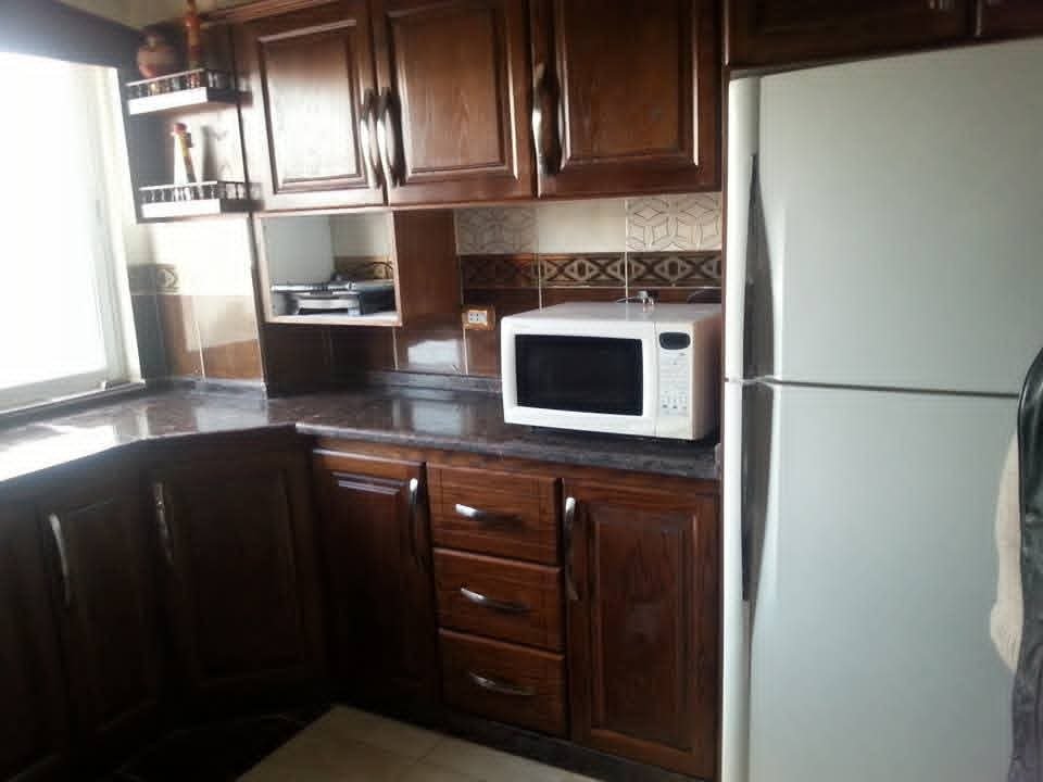 Kitchen base cabinets, drawers and microwave area